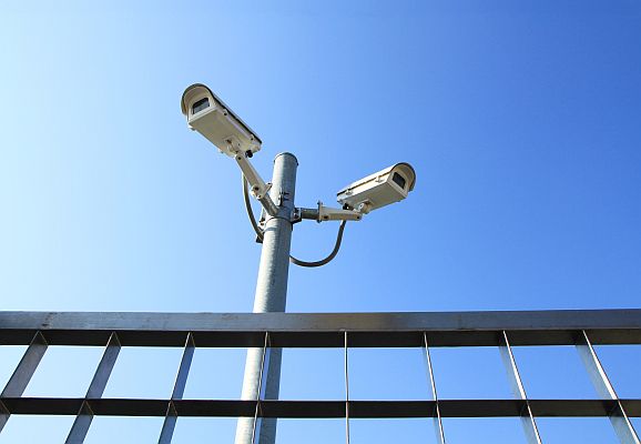 Two analogue cameras covering a fenceline