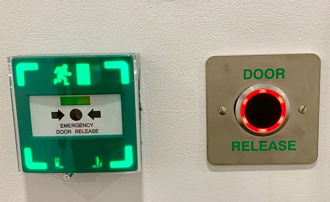 Illuminated break glass device and door release button