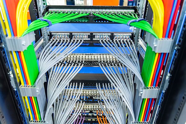 Cable management at rear of network rack